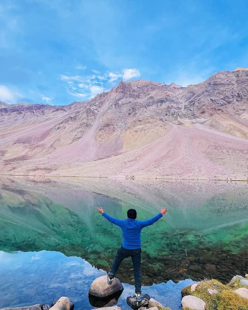 Chandratal Lake in Spiti Valley — crystal clear turquoise waters reflecting the Himalayan peaks